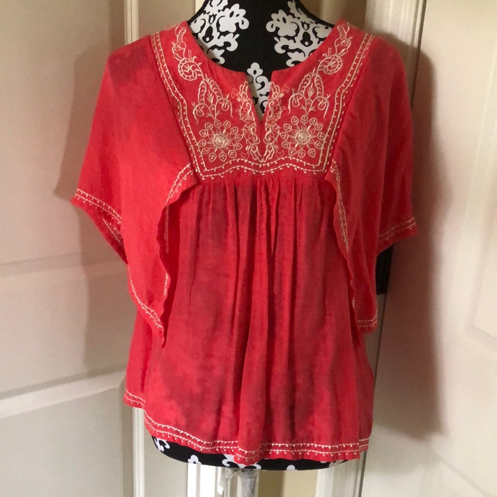 Beautiful blouse, embroidery details on the chest sleeves and bottom
